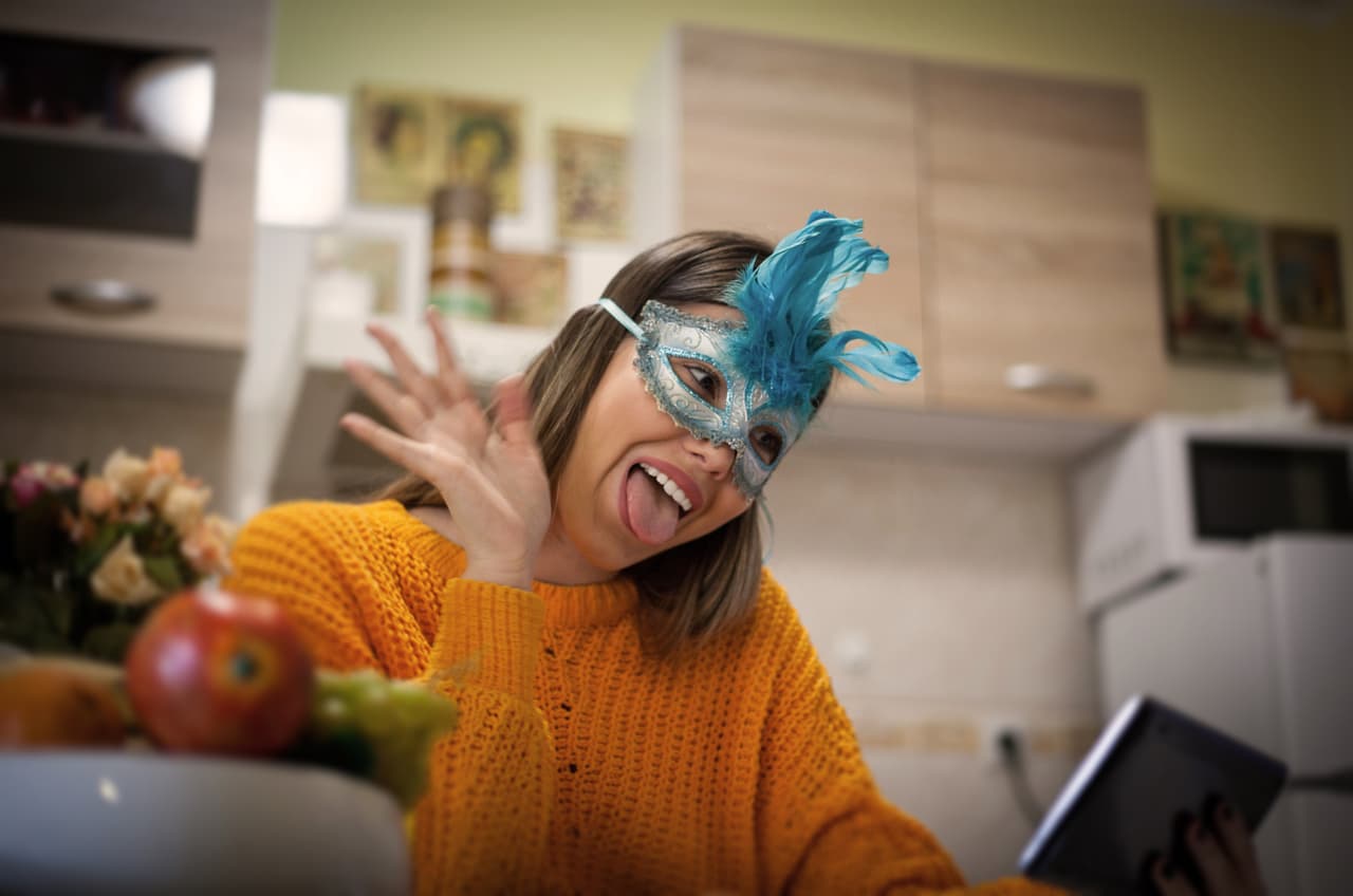 Woman using digital tablet making video call.