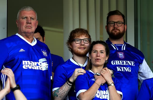 IPSWICH, ENGLAND - APRIL 21: Musician Ed Sheeran and fiance Cherry Seaborn look on during the Sky Bet Championship match between Ipswich Town and Aston Villa at Portman Road on April 21, 2018 in Ipswich, England. (Photo by Stephen Pond/Getty Images)