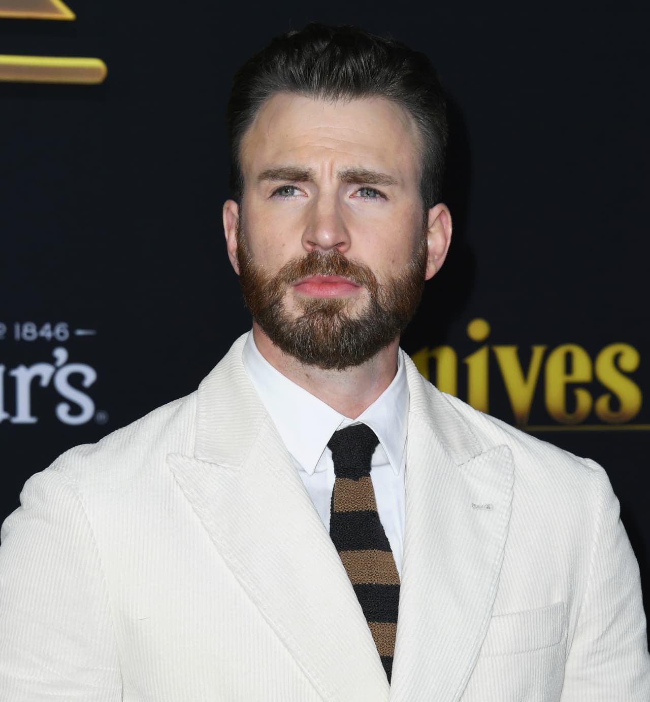 WESTWOOD, CALIFORNIA - NOVEMBER 14: Chris Evans attends the premiere of Lionsgate's "Knives Out" at Regency Village Theatre on November 14, 2019 in Westwood, California. (Photo by Jon Kopaloff/Getty Images,)