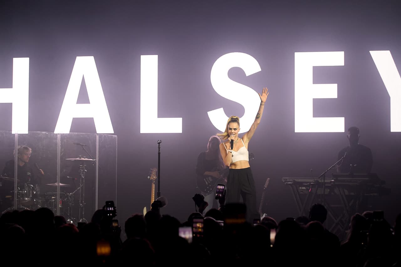 NEW YORK, NEW YORK - SEPTEMBER 09: Cara Delevingne speaks onstage as DKNY turns 30 with special live performances by Halsey and The Martinez Brothers at St. Ann's Warehouse on September 09, 2019 in New York City. (Photo by Dimitrios Kambouris/Getty Images for DKNY)
