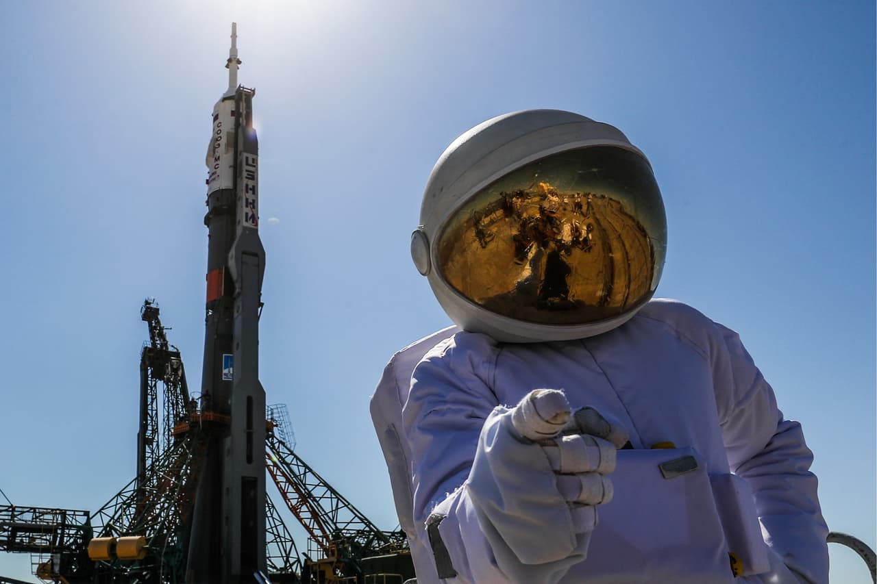 KAZAKHSTAN JULY 18, 2019: A blogger dressed in a spacesuit as a Soyuz-FG rocket booster carrying the Soyuz MS-13 spacecraft being installed on a launch pad at the Baikonur Cosmodrome. The launch of the Soyuz MS-13 spacecraft crew of Roscosmos cosmonaut Alexander Skvortsov, European Space Agency (ESA) astronaut Luca Parmitano, and NASA astronaut Andrew R. Morgan to the International Space Station (ISS) is scheduled for July 20, 2019 at 19:28 Moscow time. Sergei Savostyanov/TASS (Photo by Sergei Savostyanov\TASS via Getty Images)
