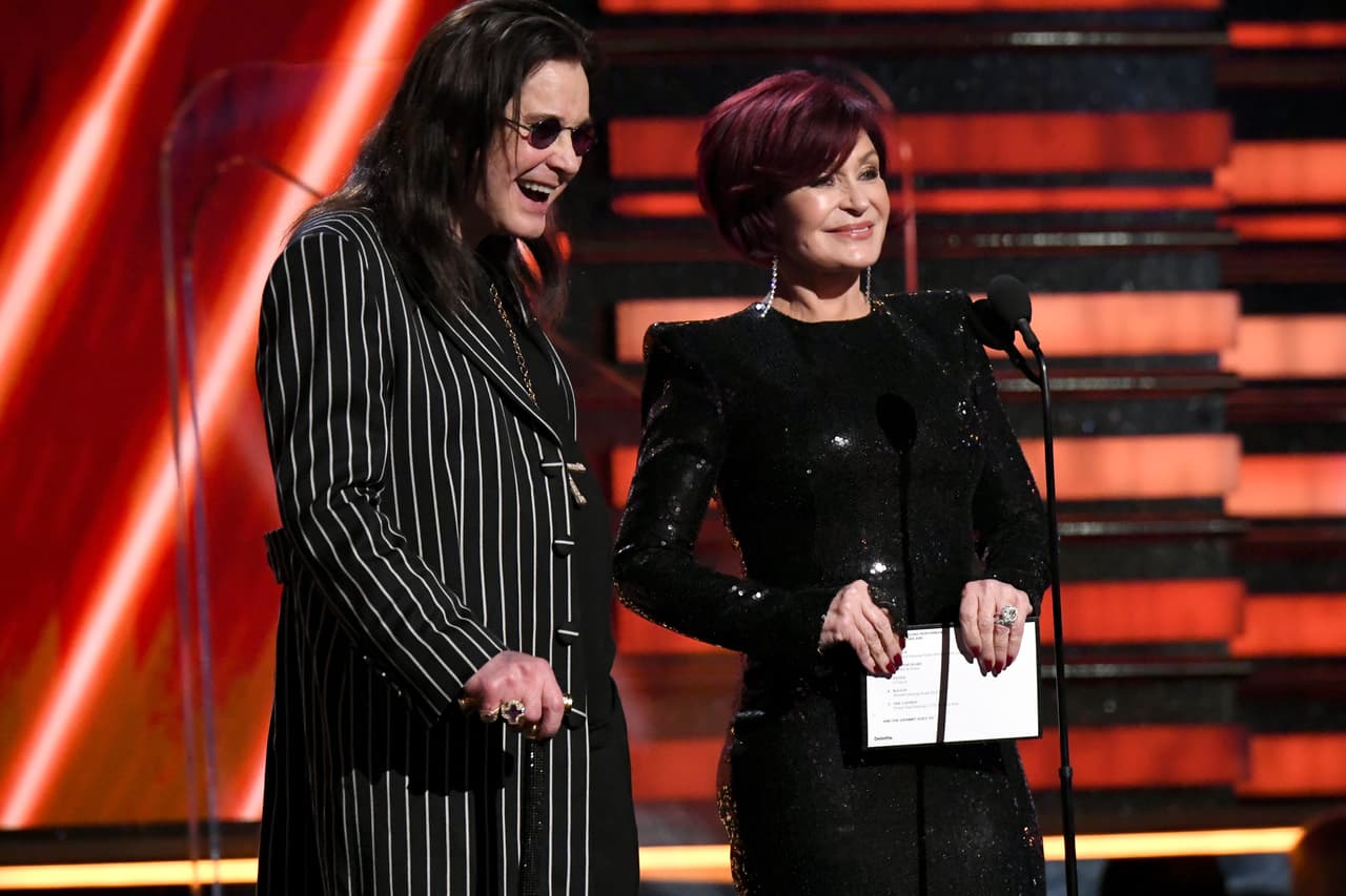 LOS ANGELES, CALIFORNIA - JANUARY 26: (L-R) Ozzy Osbourne and Sharon Osbourne speak onstage during the 62nd Annual GRAMMY Awards at Staples Center on January 26, 2020 in Los Angeles, California. (Photo by Jeff Kravitz/FilmMagic)