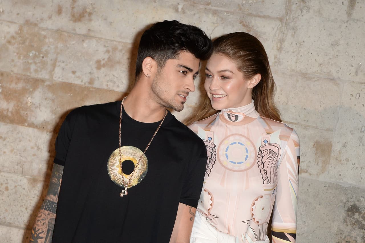 PARIS, FRANCE - OCTOBER 02: Zayn Malik and Gigi Hadid attend the Givenchy show as part of the Paris Fashion Week Womenswear Spring/Summer 2017on October 2, 2016 in Paris, France. (Photo by Stephane Cardinale - Corbis/Corbis via Getty Images)