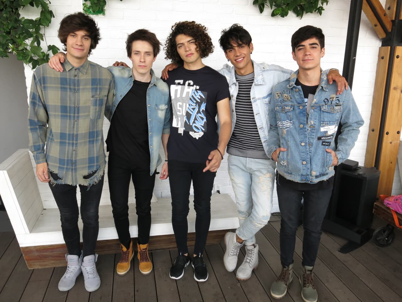 In this July 18, 2017 photo, CD9 band members, from left, Bryan Mouque, Alonso Villalpando, Freddy Pacheco, Alan Leyva and Jos Canela pose during a photo session in Mexico City. The Mexican band launched its EP “.5” on July 14. (AP Photo/Berenice Bautista)