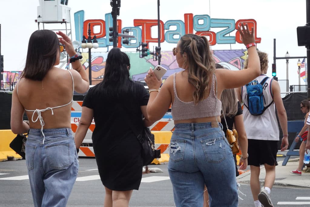CHICAGO, ILLINOIS - JULY 29: Guests arrive for the first day of the Lollapalooza music festival on July 29, 2021 in Chicago, Illinois. The four-day music festival in the city's downtown is expected to draw 110,000 fans each day. (Photo by Scott Olson/Getty Images)