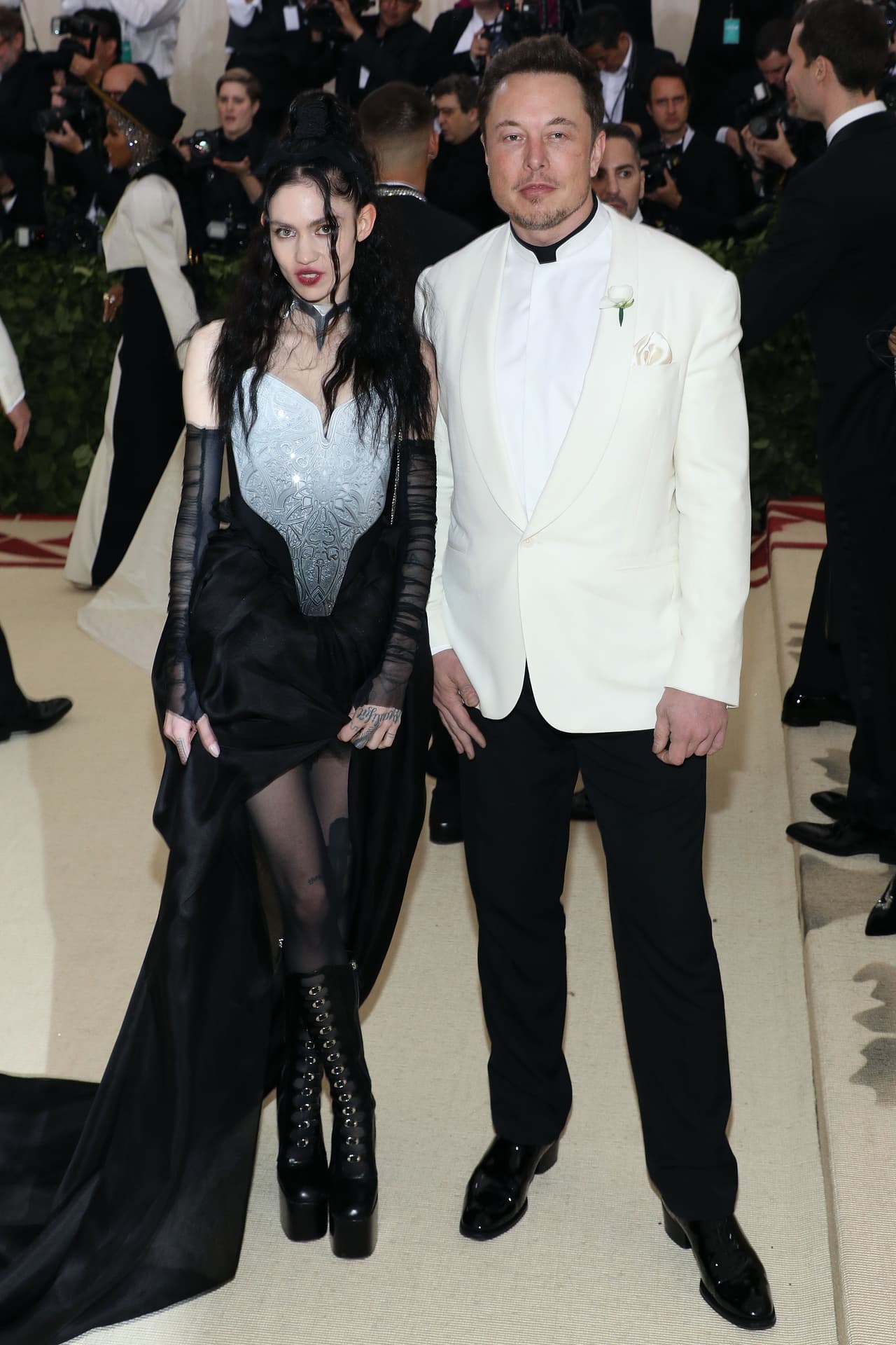 NEW YORK, NY - MAY 07: Grimes and Elon Musk attend "Heavenly Bodies: Fashion & the Catholic Imagination", the 2018 Costume Institute Benefit at Metropolitan Museum of Art on May 7, 2018 in New York City. (Photo by Taylor Hill/Getty Images)