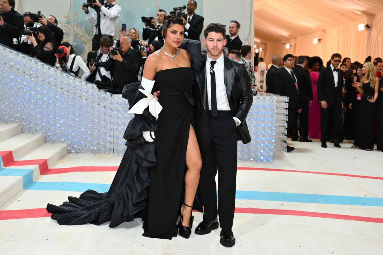 Indian actress Priyanka Chopra Jonas (L) and US singer/songwriter Nick Jonas arrive for the 2023 Met Gala at the Metropolitan Museum of Art on May 1, 2023, in New York. - The Gala raises money for the Metropolitan Museum of Art's Costume Institute. The Gala's 2023 theme is "Karl Lagerfeld: A Line of Beauty." (Photo by Angela WEISS / AFP) (Photo by ANGELA WEISS/AFP via Getty Images)