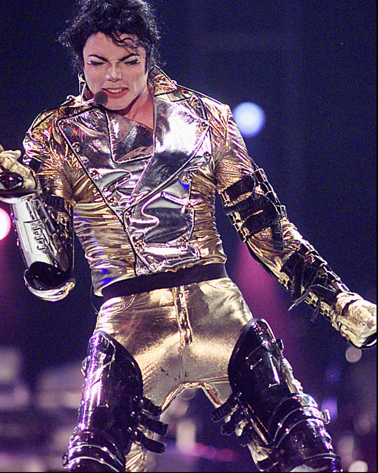Michael Jackson during his first Australian concert in Sydney, Thursday, November 14, 1996. There is rumour that Jackson is to marry Debbie Rowe, the woman claiming to be carrying his child, in a private ceremony in Sydney. (AP Photo/Rick Rycroft)