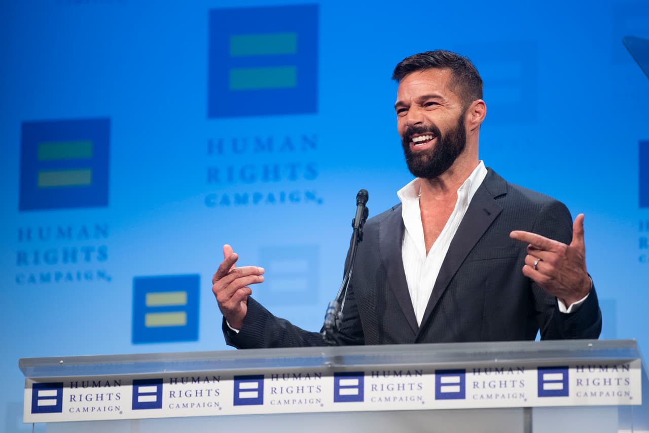 IMAGE DISTRIBUTED FOR THE HUMAN RIGHTS CAMPAIGN - Global music icon and Human Rights Campaign National Visibility Award recipient Ricky Martin speaks at the 2019 HRC National Dinner on Saturday, Sept. 28, 2019 in Washington. (Kevin Wolf/AP Images for The Human Rights Campaign)