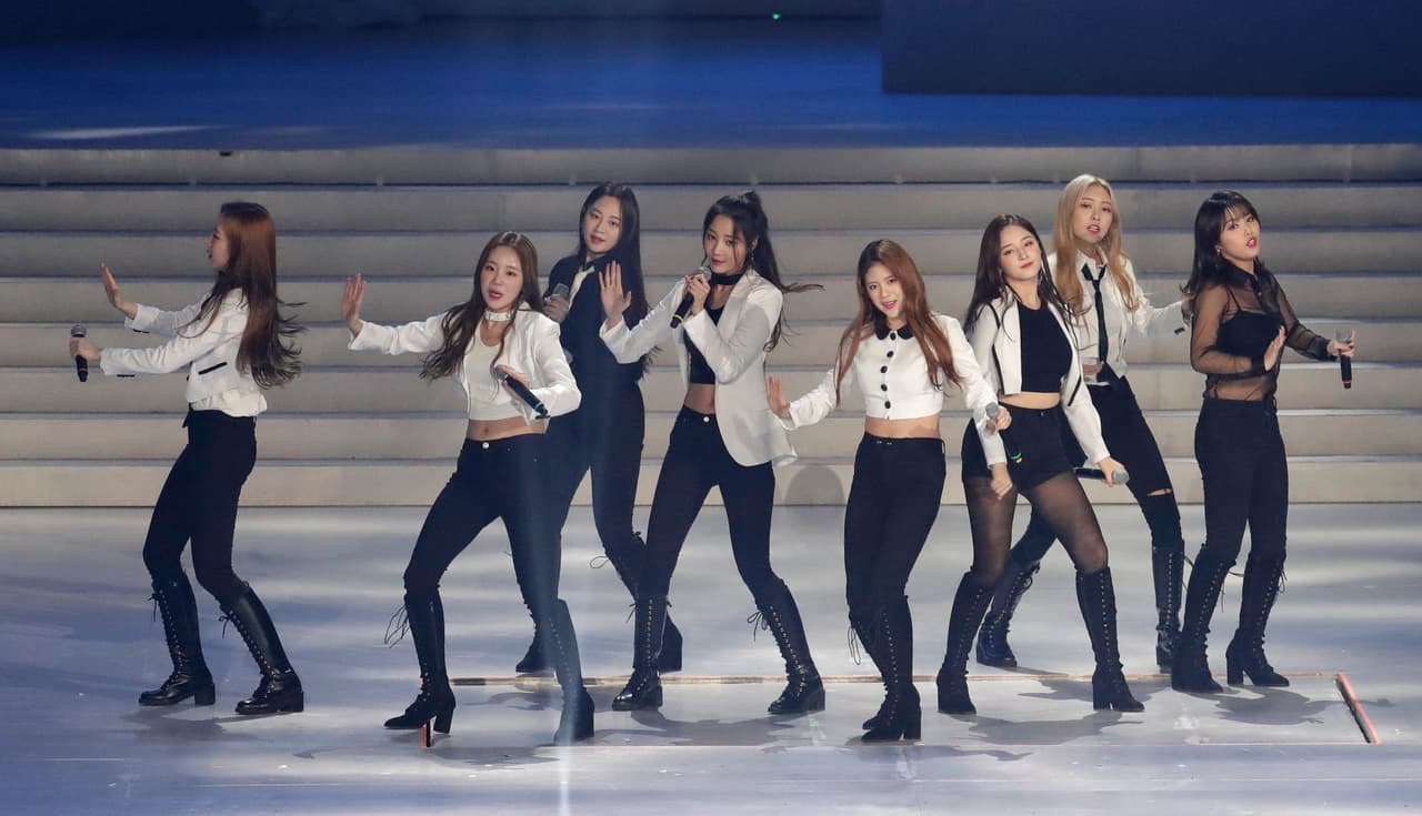 K-pop girl group Momoland perform during the 1st anniversary festival of the Pyeongchang Winter Olympics and Paralympics at Gangneung Ice Arena in Gangneung, South Korea, Saturday, Feb. 9, 2019. South Korea celebrate the 1st anniversary of the Pyeongchang Winter Olympics and Paralympics which were held from Feb. 9 to 25 and from March 9 to 18 in Gangwon Province. (AP Photo/Lee Jin-man)