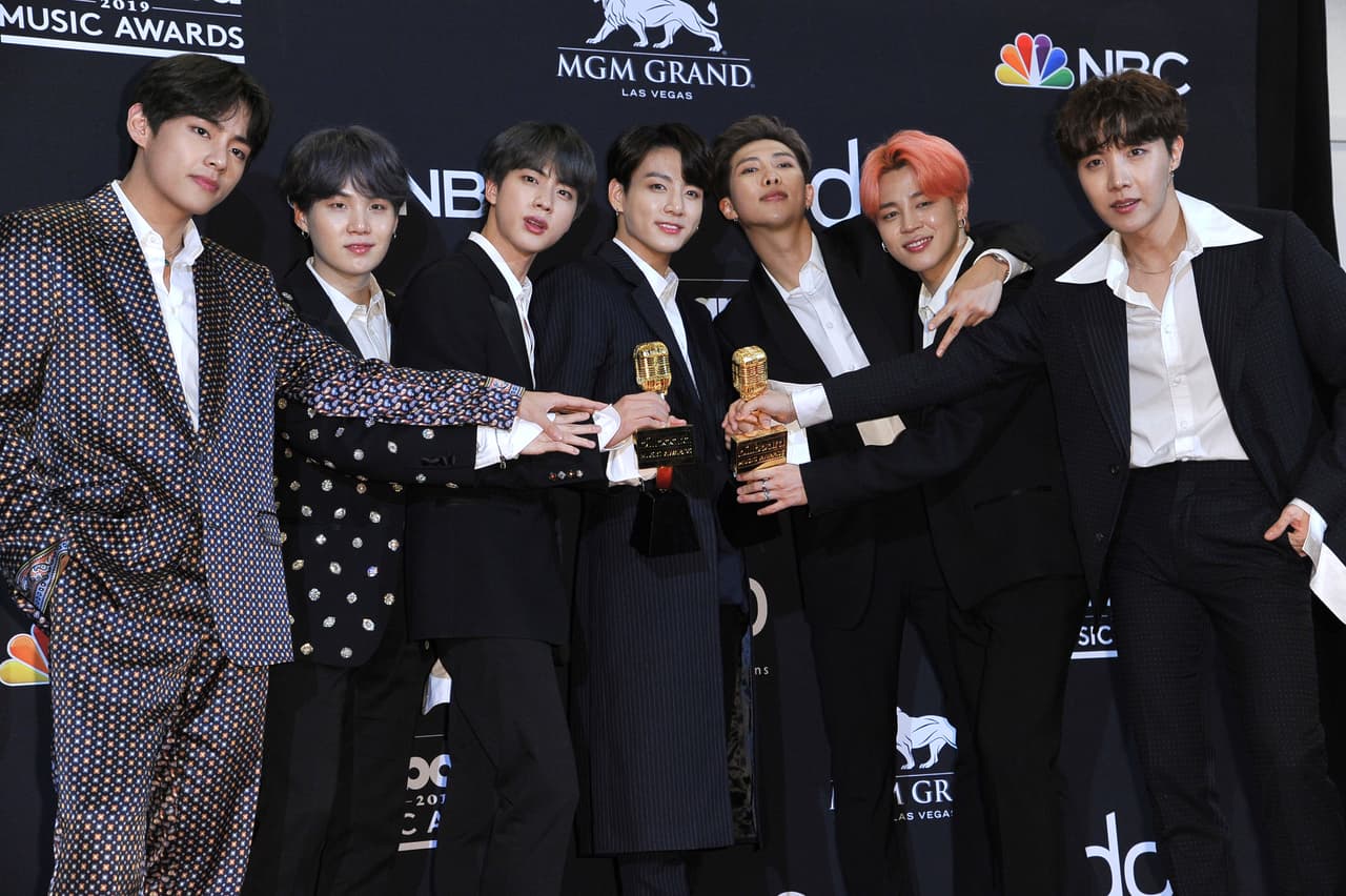 BTS poses in the press room with the award for top duo group and top social artist at the Billboard Music Awards on Wednesday, May 1, 2019, at the MGM Grand Garden Arena in Las Vegas. (Photo by Richard Shotwell/Invision/AP)