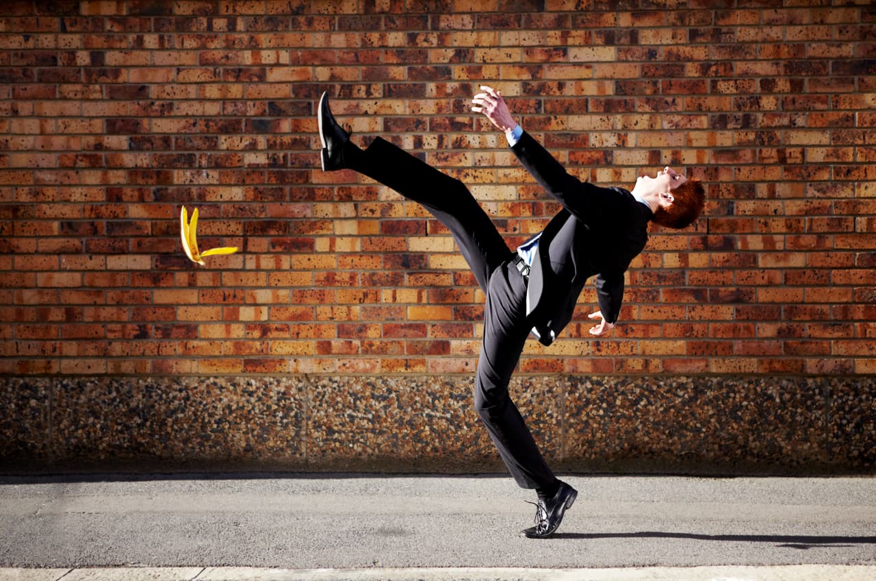 A young businessman slipping on a banana peelhttp://195.154.178.81/DATA/i_collage/pi/shoots/781055.jpg