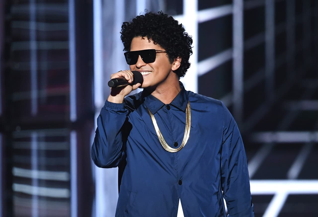 LAS VEGAS, NV - MAY 20: Bruno Mars speaks onstage during the 2018 Billboard Music Awards at MGM Grand Garden Arena on May 20, 2018 in Las Vegas, Nevada. (Photo by Kevin Winter/Getty Images)