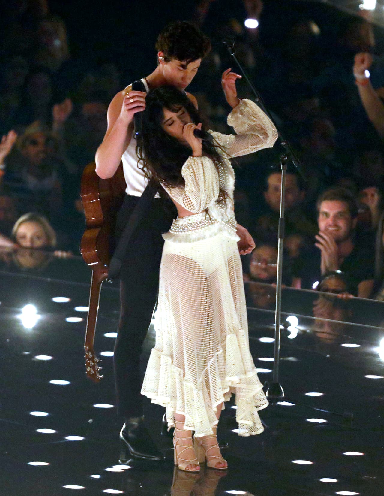 Camila Cabello, foreground, and Shawn Mendes perform "Senorita" at the MTV Video Music Awards at the Prudential Center on Monday, Aug. 26, 2019, in Newark, N.J. (Photo by Matt Sayles/Invision/AP)