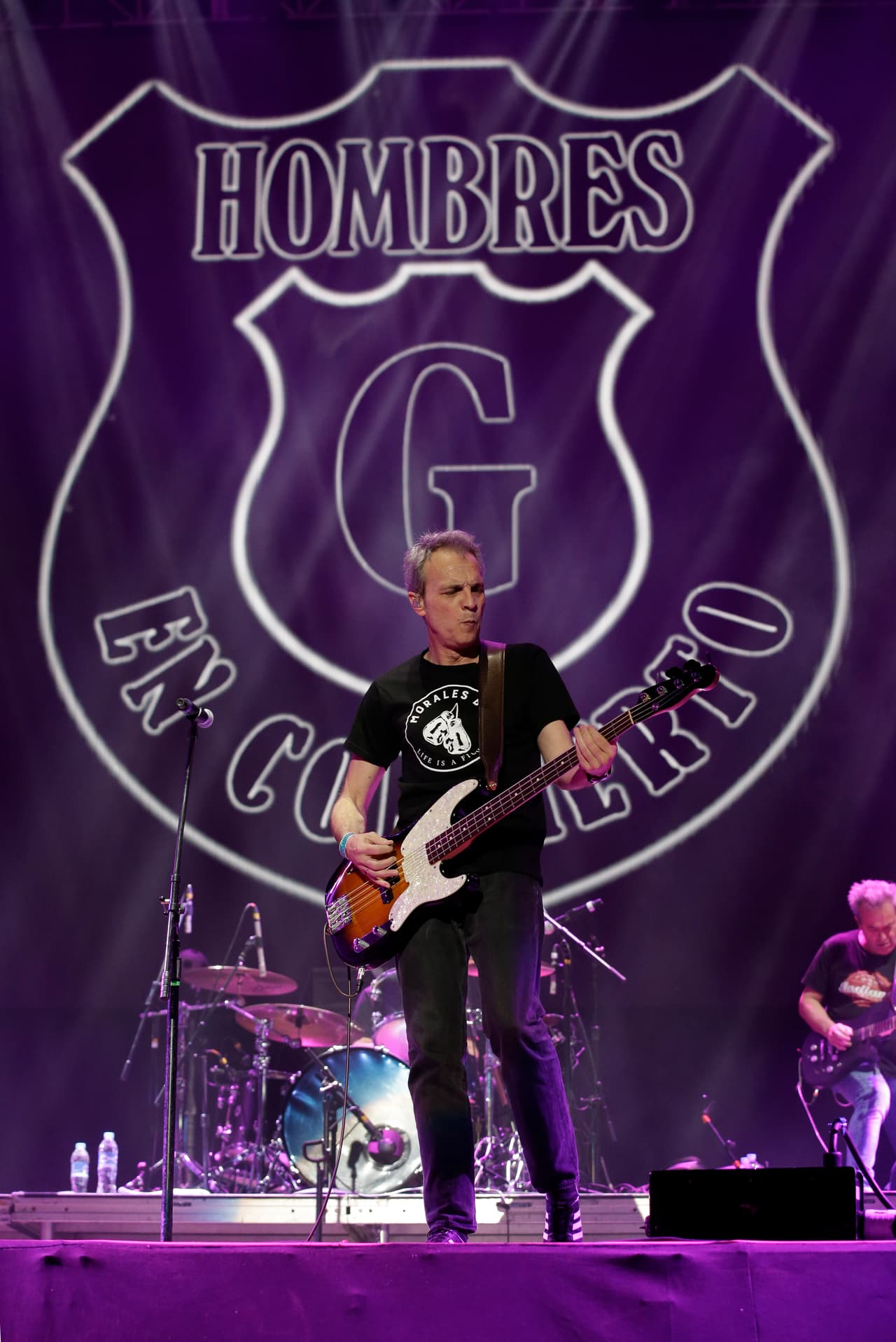 Lead singer David Summers performs with Spanish pop rock band Hombres G at Vive Latino in Mexico City, Sunday, March 19, 2017. The Vive Latino Festival has become Latin America's biggest Latin rock celebration. (AP Photo/Rebecca Blackwell)