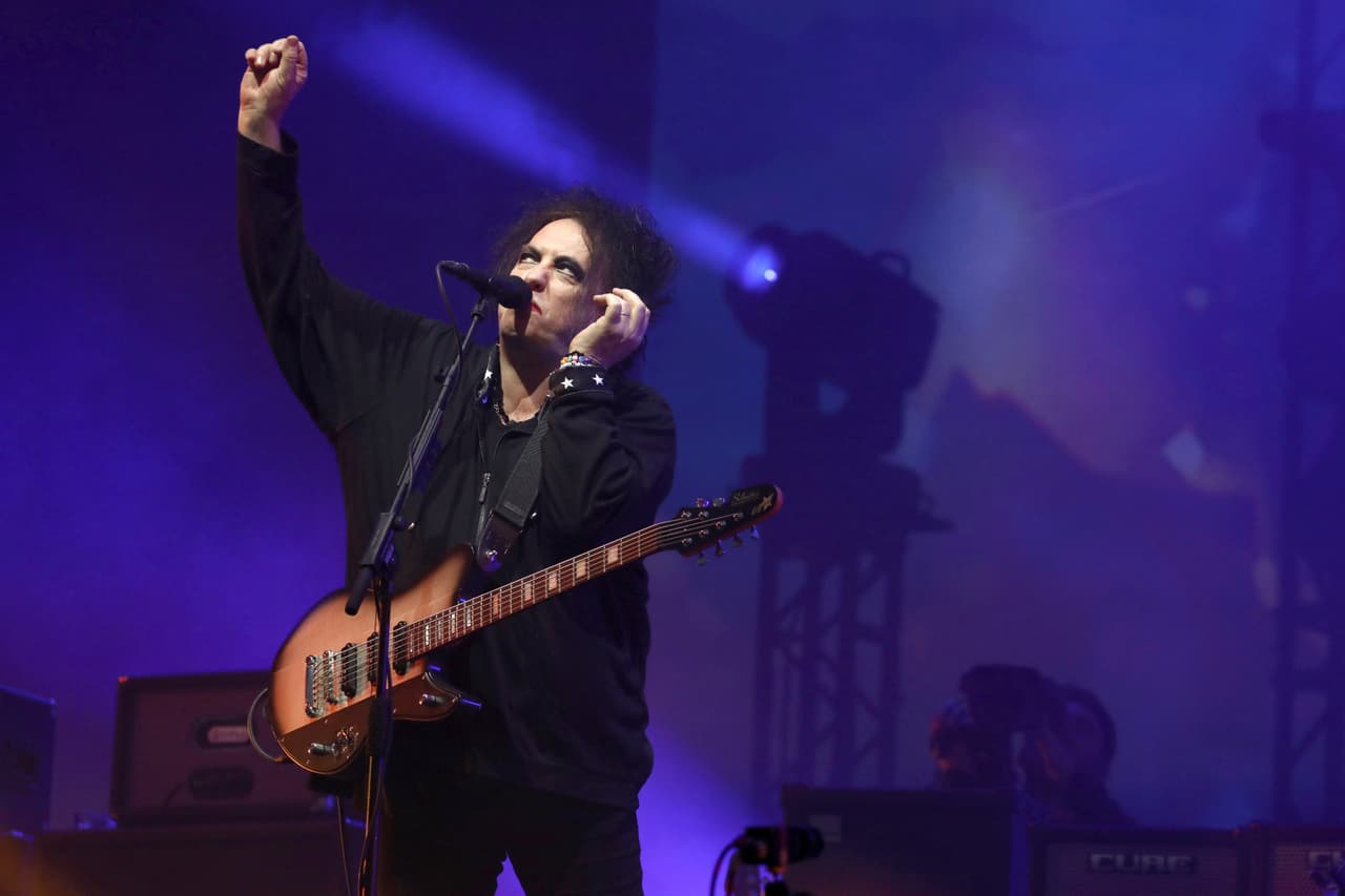 Musician Robert Smith performs with his band The Cure on the Pyramid Stage as they close the final day of the Glastonbury Festival at Worthy Farm, Somerset, England, Sunday, June 30, 2019. (Photo by Grant Pollard/Invision/AP)