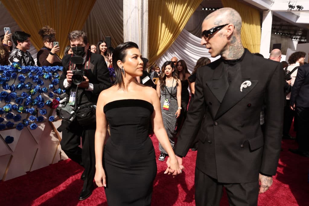 HOLLYWOOD, CALIFORNIA - MARCH 27: (L-R) Kourtney Kardashian and Travis Barker attend the 94th Annual Academy Awards at Hollywood and Highland on March 27, 2022 in Hollywood, California. (Photo by Emma McIntyre/Getty Images)