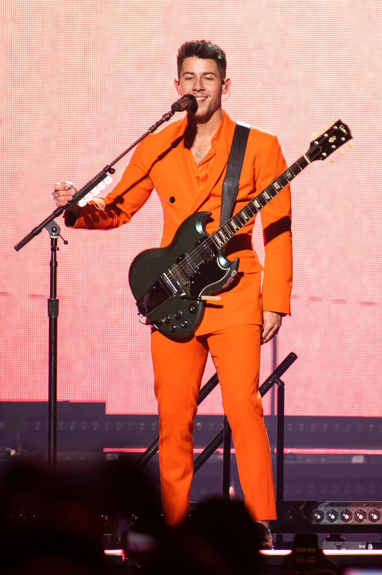 Nick Jonas, of The Jonas Brothers, performs on stage on Friday, Aug. 23, 2019, in Toronto, Canada. (Photo by Arthur Mola/Invision/AP)