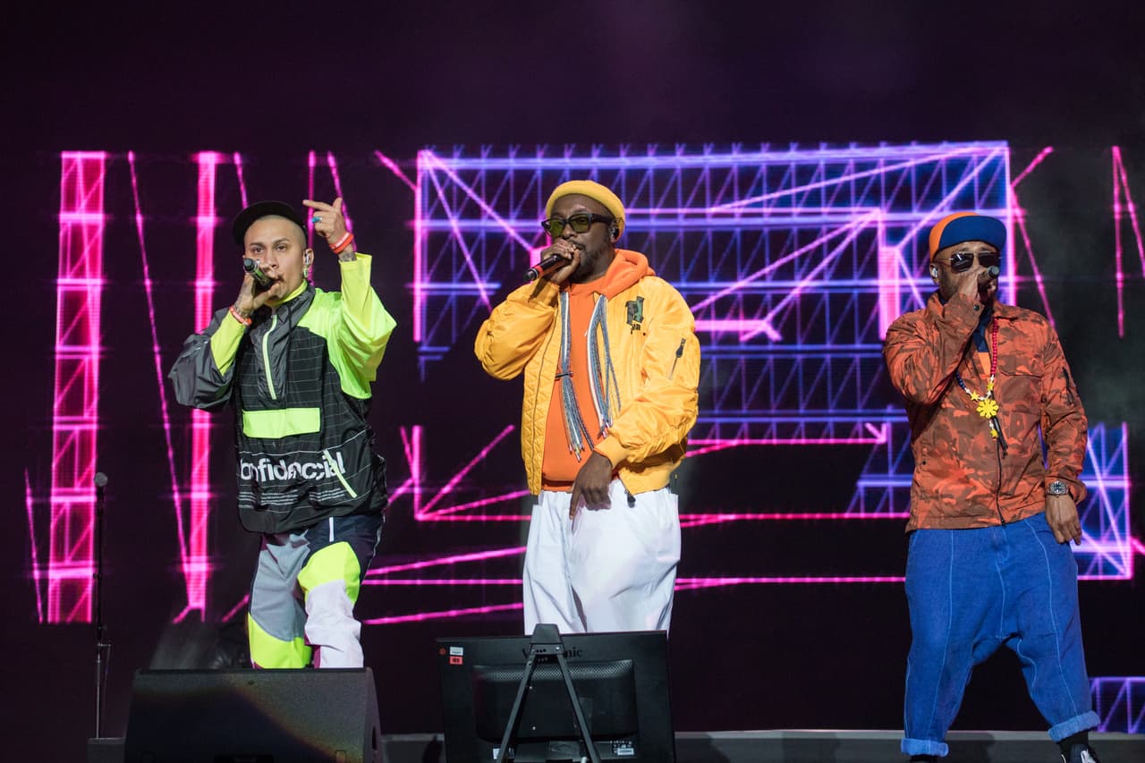 ARLINGTON, TEXAS - MAY 11: (L-R) Rappers Taboo, will.i.am, and apl.de.ap of The Black Eyed Peas perform onstage during day two of KAABOO Texas at AT&T Stadium on May 11, 2019 in Arlington, Texas. (Photo by Rick Kern/WireImage)