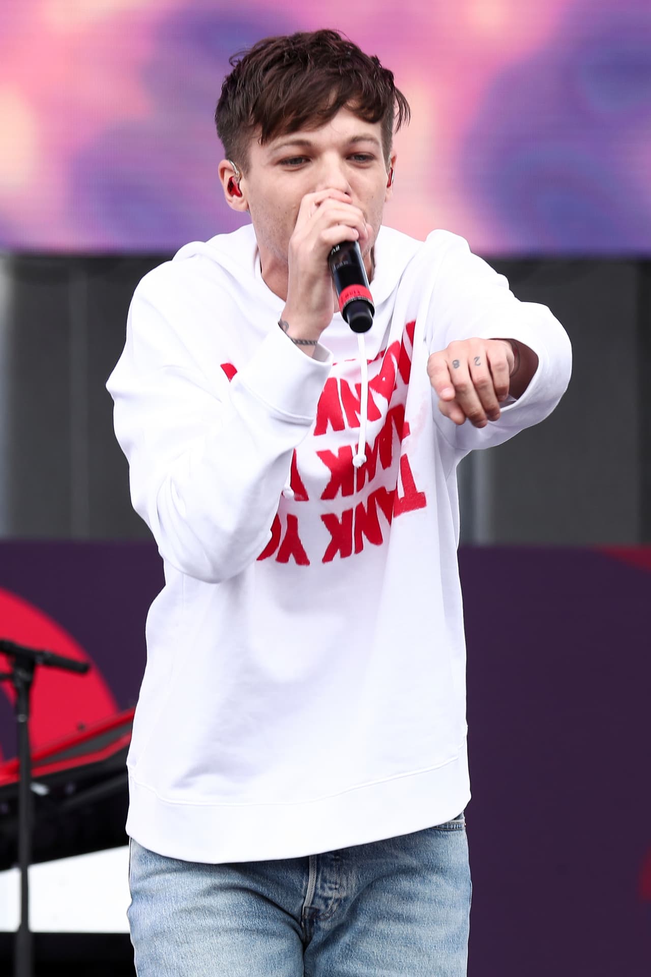 Louis Tomlinson performs at the 2017 iHeartRadio Daytime Village on Saturday, Sept. 23, 2017, in Las Vegas. (Photo by John Salangsang/Invision/AP)