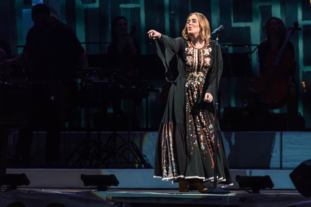 GLASTONBURY, ENGLAND - JUNE 25: Adele performs on The Pyramid Stage on day 2 of the Glastonbury Festival at Worthy Farm, Pilton on June 25, 2016 in Glastonbury, England. Now its 46th year the festival is one largest music festivals in the world and this year features headline acts Muse, Adele and Coldplay. The Festival, which Michael Eavis started in 1970 when several hundred hippies paid just Â£1, now attracts more than 175,000 people. (Photo by Ian Gavan/Getty Images)