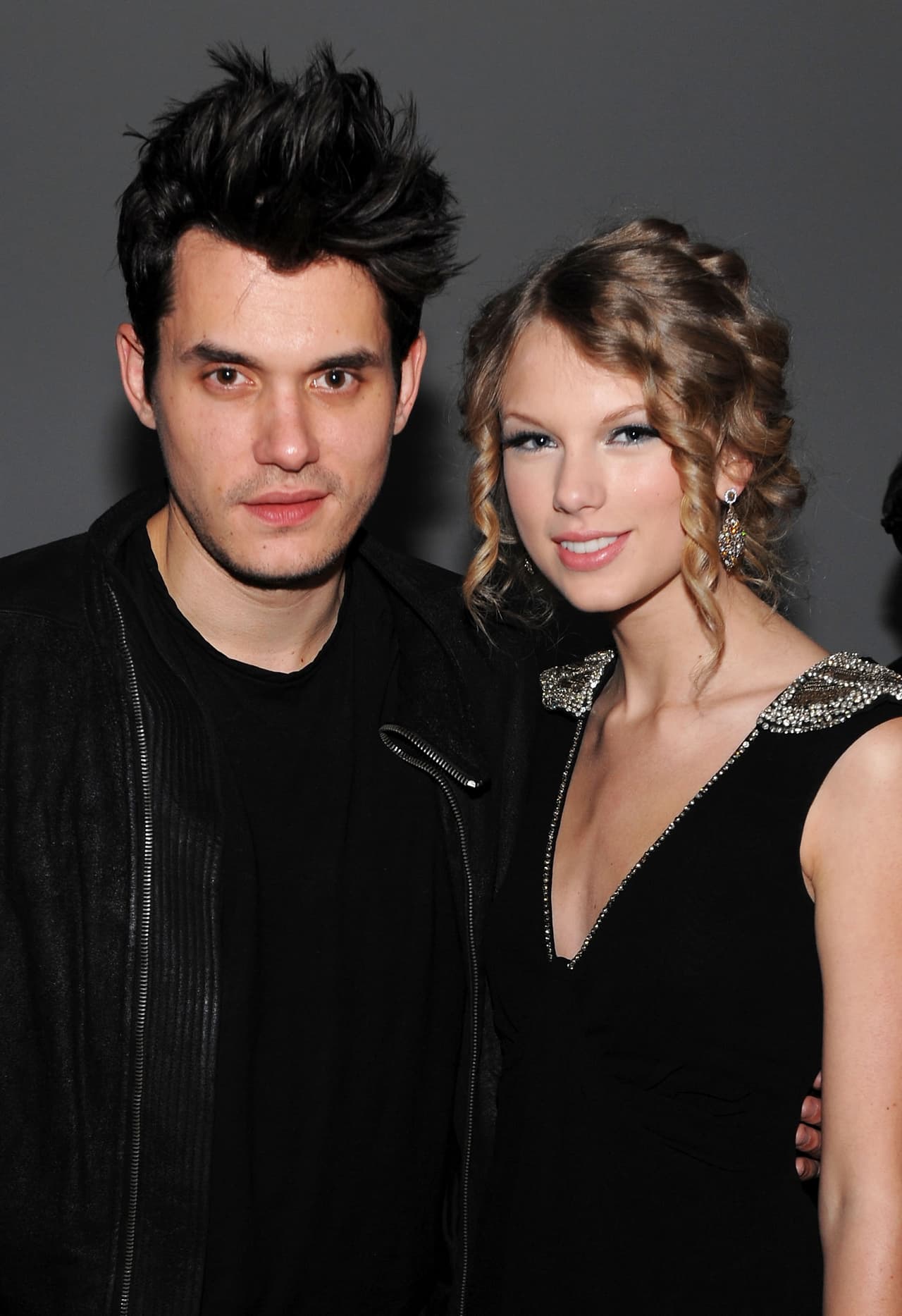En ese año también salió por un tiempo con el cantante John Mayer, con quien también hizo una colaboración llamada "Half of my Heart", de hecho, se dice que fue a raíz de esa canción que comenzaron su relación. Los rumores también especulan que las canciones “Dear John” y “I Knew You Were Trouble” hablan de él.
