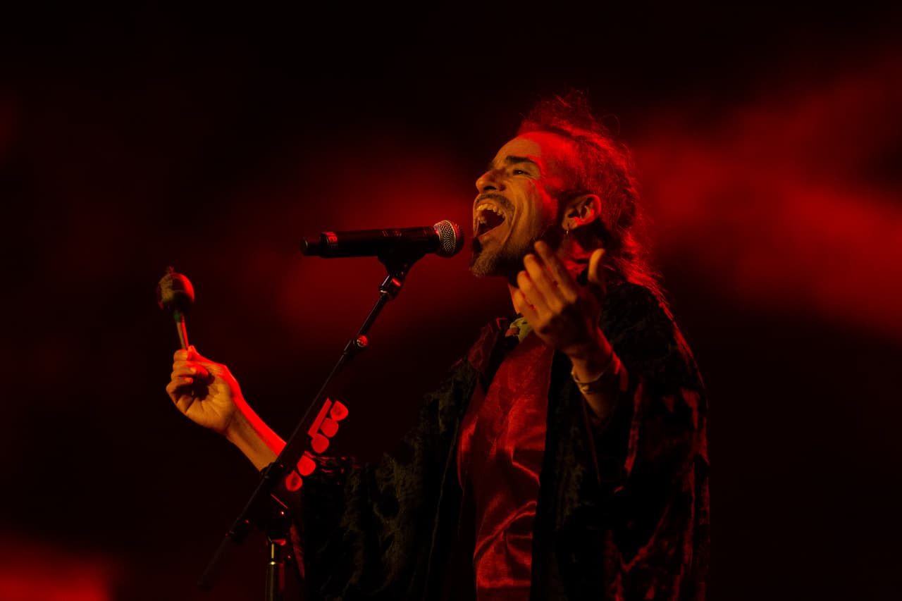 Ruben Albarran sings during a concert in Mexico City, Saturday Dec. 7, 2019. Cafe Tacvba is on tour celebrating their 30th anniversary since its formation in 1989 in Ciudad Satelite, Mexico. (AP Photo/Anthony Vazquez)