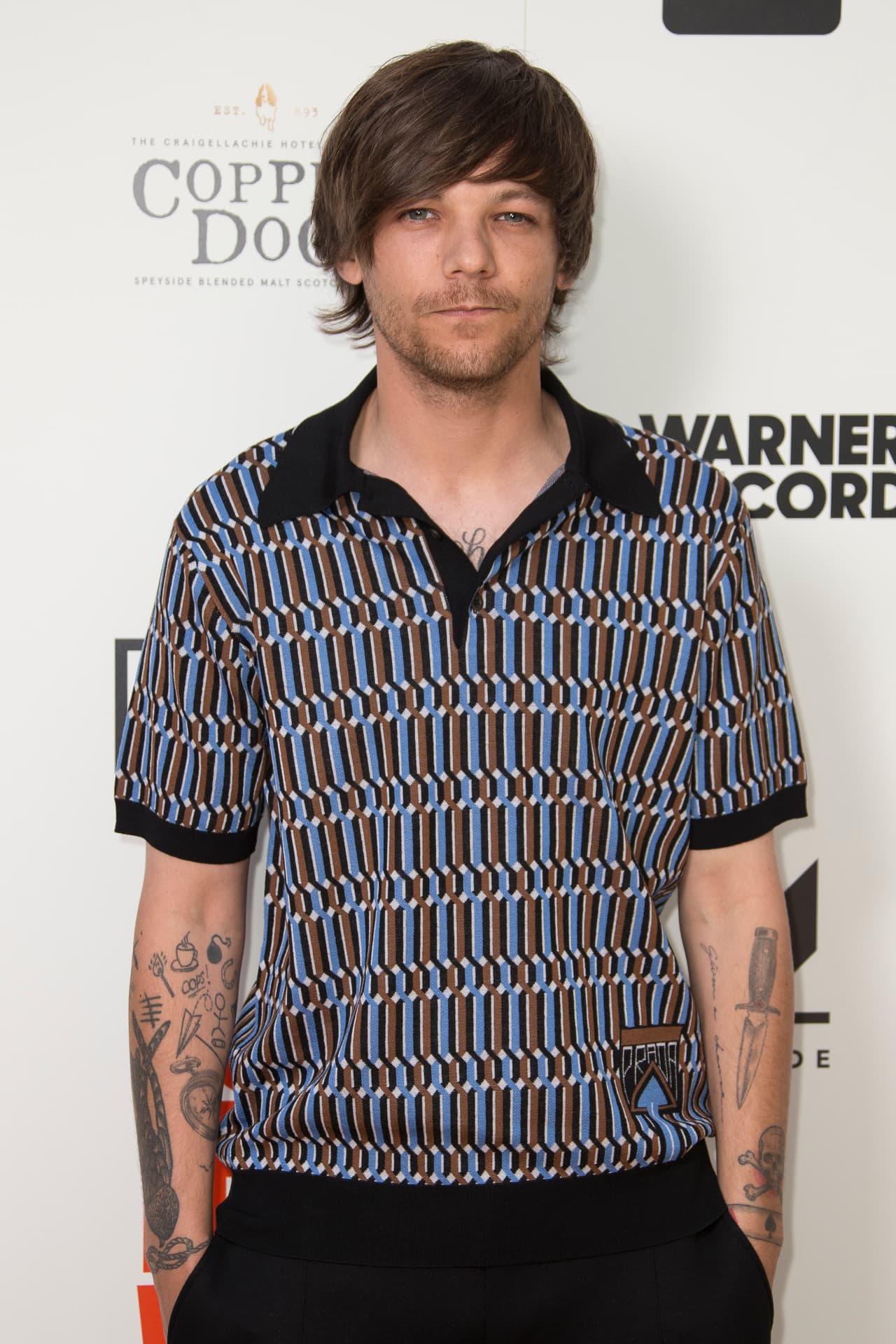 Singer Louis Tomlinson poses for photographers upon arrival at the screening for 'As it Was', at Alexandra Palace in north London, Thursday, June 6, 2019. (Photo by Joel C Ryan/Invision/AP)