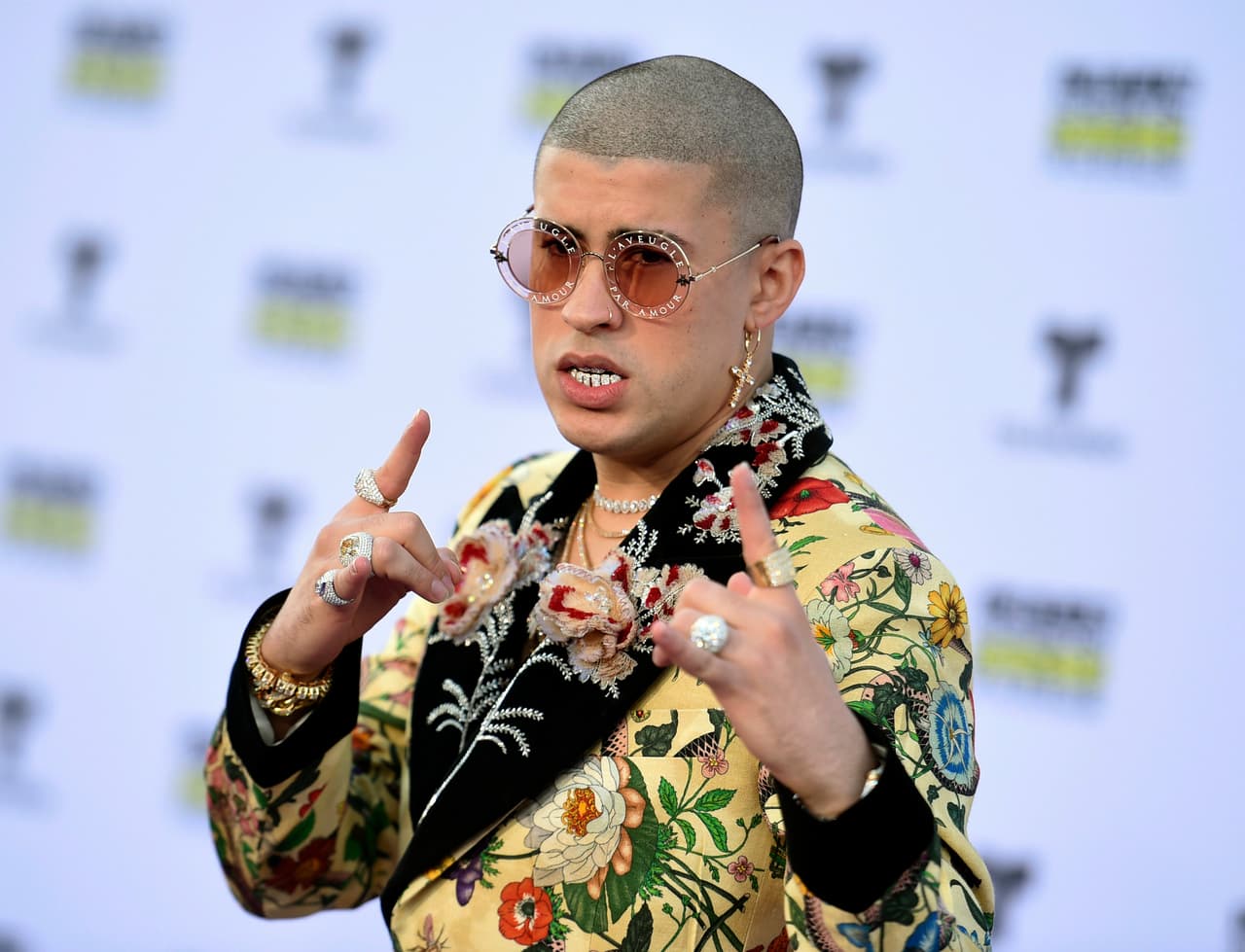 FILE - In this Oct. 26, 2017 file photo, Bad Bunny arrives at the Latin American Music Awards in Los Angeles. On March 8, 2018 Bad Bunny premiered a short in Apple Music about his life in Puerto Rico. Bad Bunny is the artist of the month of Apple Music's Up Next program. (Photo by Richard Shotwell/Invision/AP, File)
