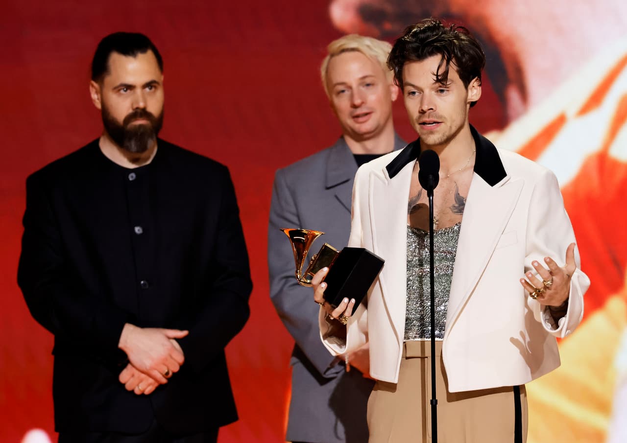 LOS ANGELES, CALIFORNIA - FEBRUARY 05: (L-R) Tyler Johnson, Kid Harpoon and Harry Styles accept the Album Of The Year award for “Harry's House” onstage during the 65th GRAMMY Awards at Crypto.com Arena on February 05, 2023 in Los Angeles, California. (Photo by Kevin Winter/Getty Images for The Recording Academy)