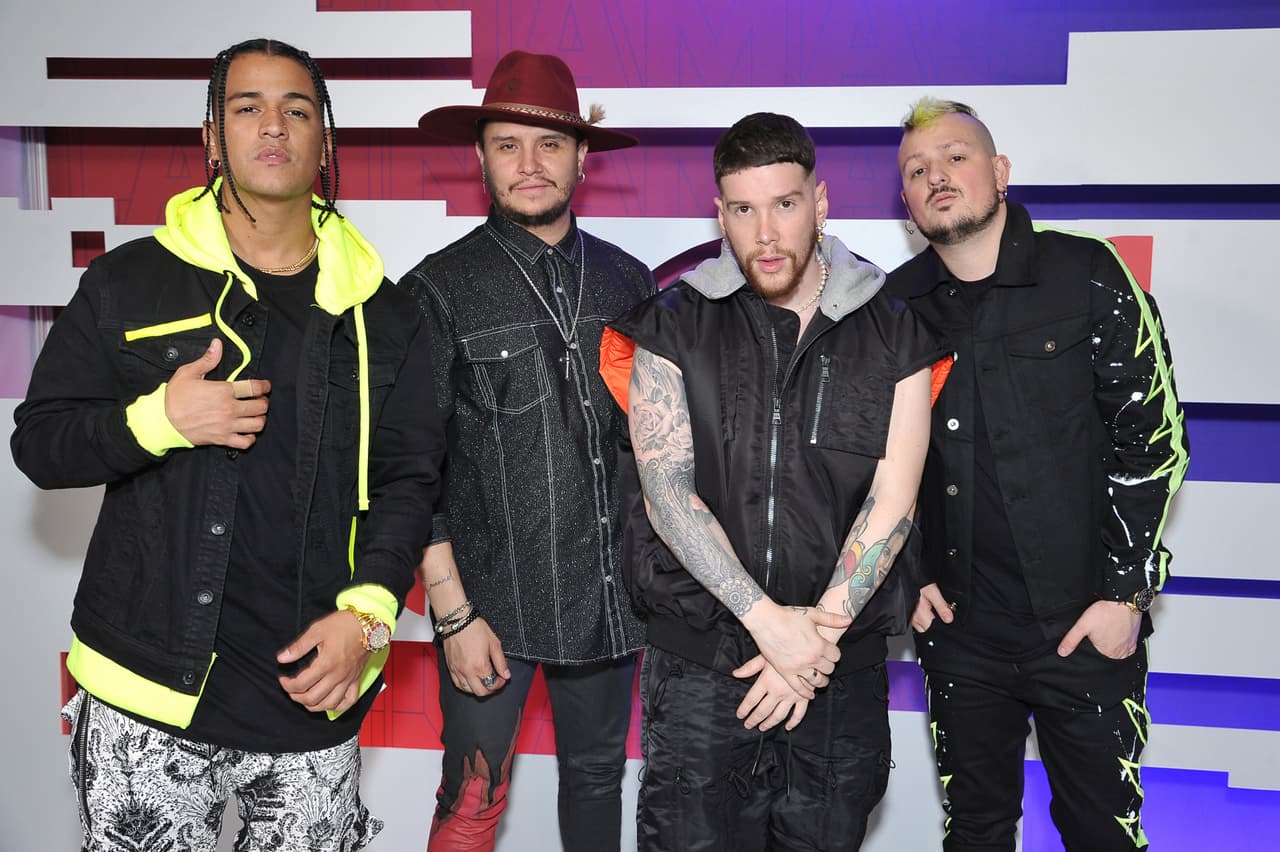 Lorduy, from left, Juan David Huertas Clavijo, David Escobar Gallego, and Pablo Mejia Bermudez, of Piso 21, pose backstage at the Latin American Music Awards on Thursday, Oct. 17, 2019, at the Dolby Theatre in Los Angeles. (Photo by Richard Shotwell/Invision/AP)