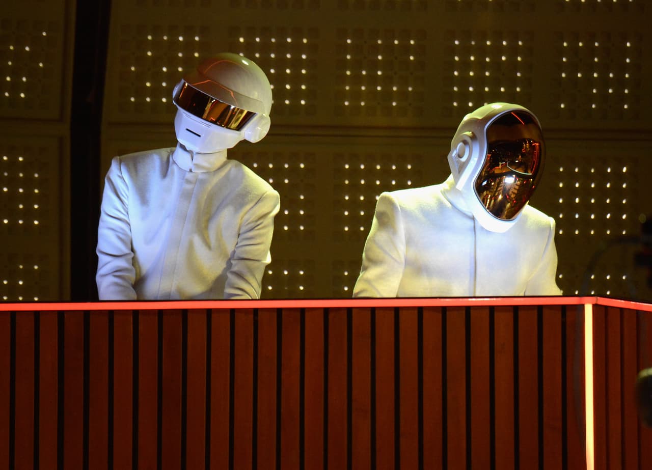 LOS ANGELES, CA - JANUARY 26: Daft Punk perform onstage during the 56th GRAMMY Awards at Staples Center on January 26, 2014 in Los Angeles, California. (Photo by Kevin Mazur/WireImage)