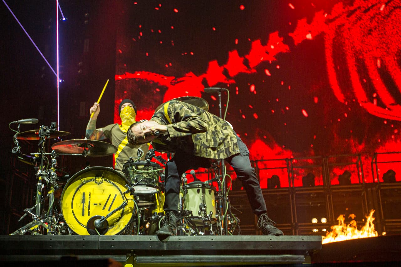 SAN DIEGO, CALIFORNIA - NOVEMBER 05: Musicians Josh Dun (L) and Tyler Joseph of Twenty One Pilots perform on stage at Pechanga Arena on November 05, 2019 in San Diego, California. (Photo by Daniel Knighton/Getty Images)