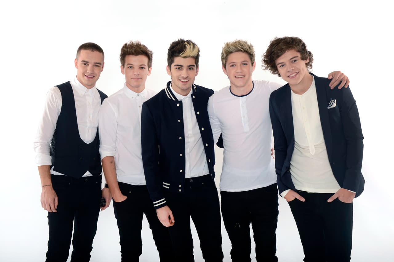 Boy band One Direction, from left, Liam Payne, Louis Tomlinson, Zayn Malik, Niall Horan and Harry Styles are seen backstage at BBC's Children in Need at Television Centre on Friday, Nov. 16, 2012, in London. (Photo by Jon Furniss/Invision for Children in Need/AP Images)