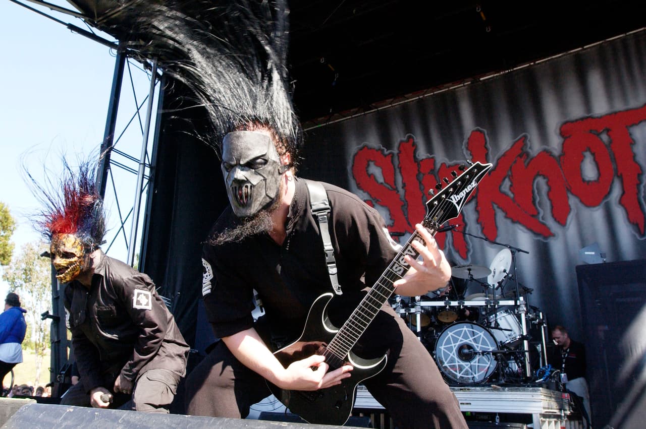 MOUNTAIN VIEW CA - JULY 29: Corey (#0) (Left) and Mick (#7) of Slipknot performing as part of Ozzfest 2004 at Shoreline Amphitheater on July 29, 2004 in Mountain View, California. (Photo by Tim Mosenfelder/Getty Images)