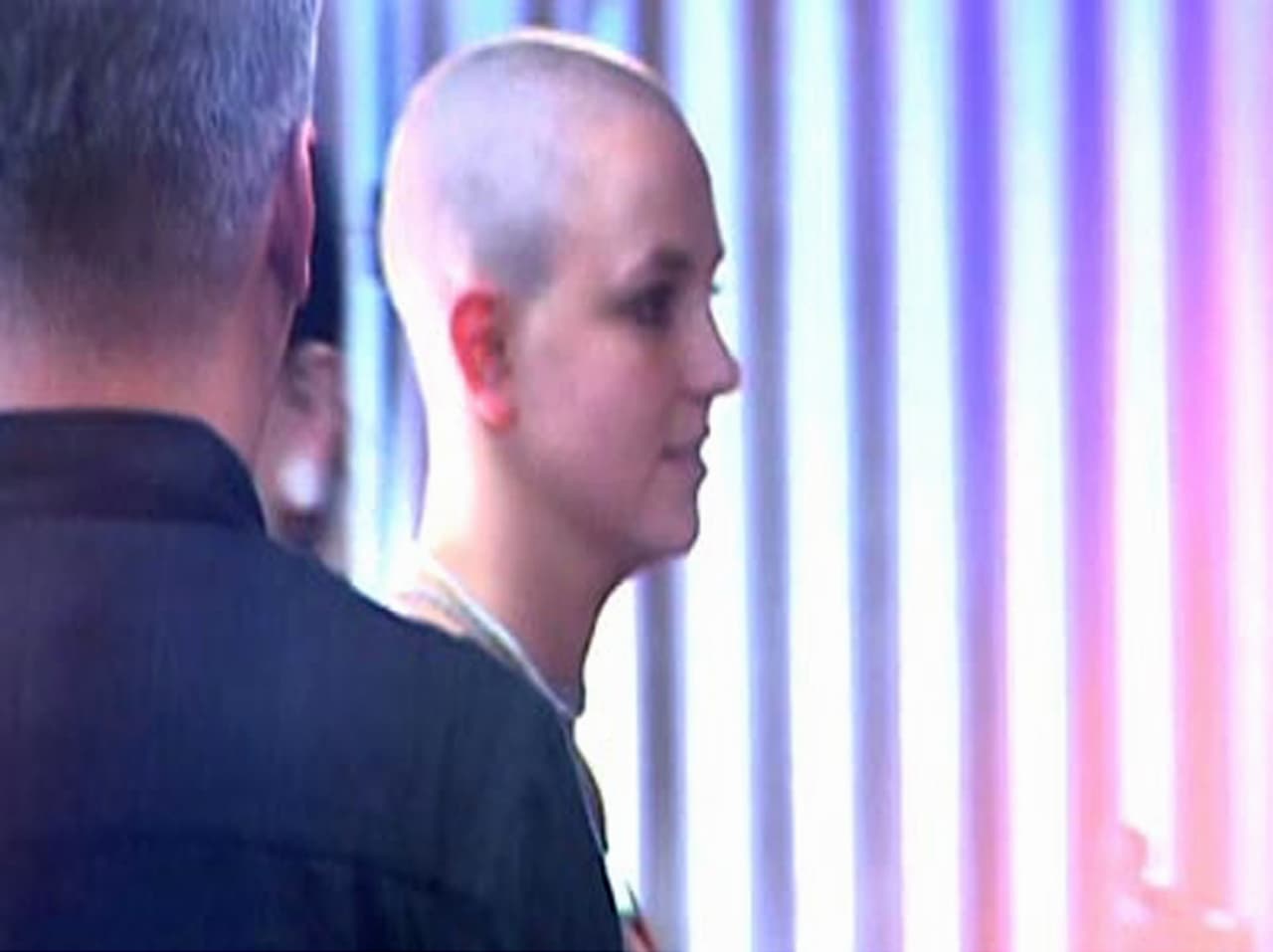 In this photo made from video provided by KABC-TV, Pop singer Britney Spears is at a Sherman Oaks, Calif., tattoo parlor Friday night, Feb. 16, 2007. Spears was there to get a couple of tiny tattoos on her wrist, a pair of pink and red lips, according to KABC-TV. (AP Photo/KABC-TV)