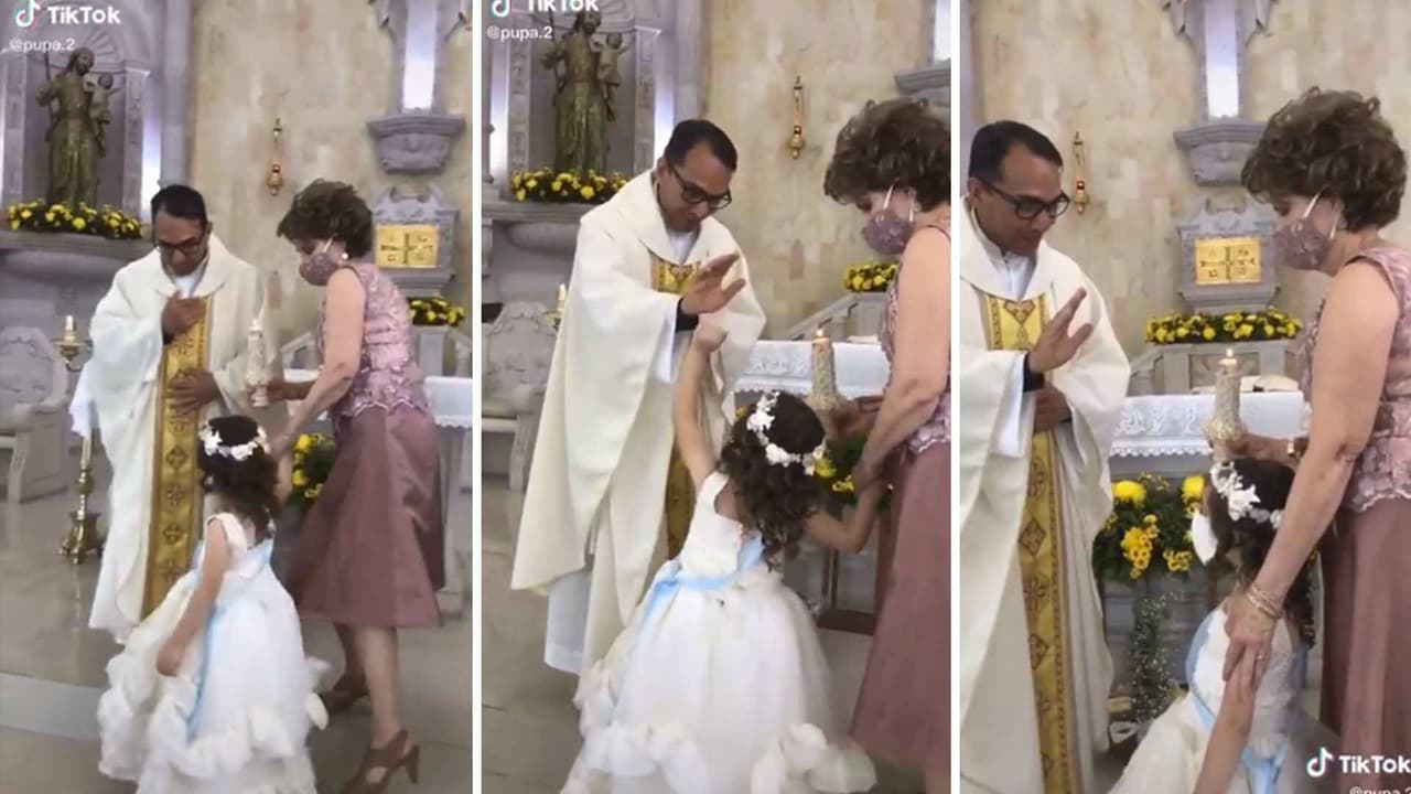 'Chóquela, padre': Niña provoca la risa de un sacerdote durante una ceremonia religiosa
