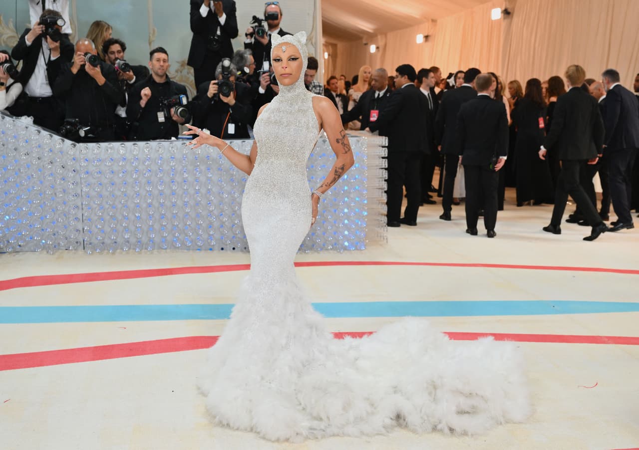 US rapper Doja Cat arrives for the 2023 Met Gala at the Metropolitan Museum of Art on May 1, 2023, in New York. - The Gala raises money for the Metropolitan Museum of Art's Costume Institute. The Gala's 2023 theme is "Karl Lagerfeld: A Line of Beauty." (Photo by ANGELA WEISS / AFP) (Photo by ANGELA WEISS/AFP via Getty Images)