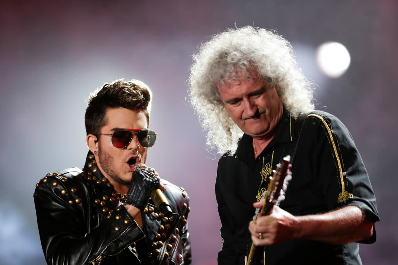 FILE - In tis Sept. 19, 2015 file photo Adam Lambert, left, and Brian May of Queen perform at the Rock in Rio music festival in Rio de Janeiro, Brazil. Queen has clearly found somebody to love in Lambert. Since joining forces with the “American Idol” runner-up for a series of shows in 2012, the band that ruled rock radio in the 1970s and early ‘80s has enjoyed tremendous success, with audiences embracing Lambert as the heir to Freddie Mercury’s onstage legacy. They’ve been selling out areas around the world for five years now, and have just announced a 25-city North American tour beginning June 23, 2017, in Phoenix. (AP Photo/Felipe Dana, File)