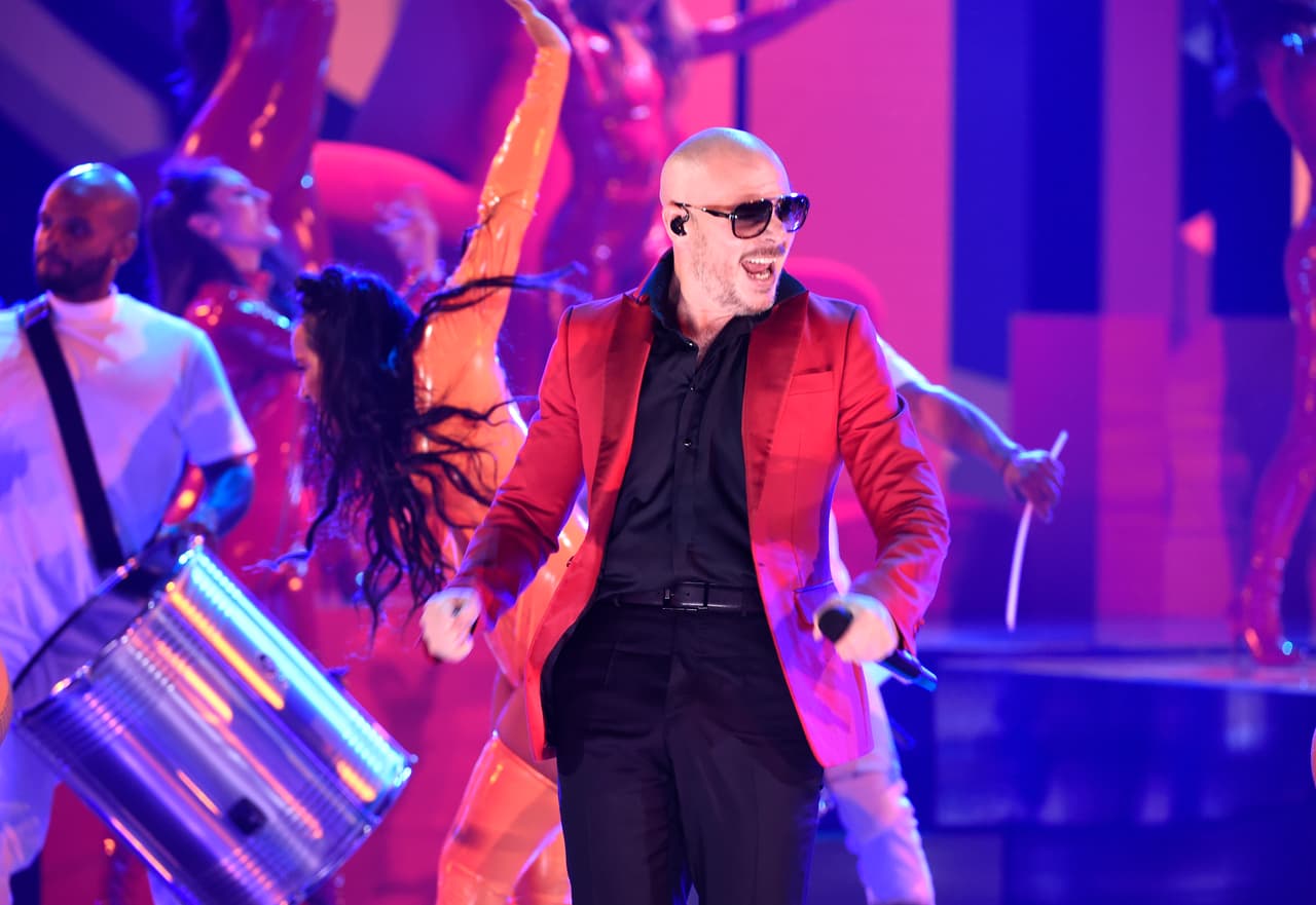 Pitbull performs at the Latin American Music Awards at the Dolby Theatre on Thursday, Oct. 25, 2018, in Los Angeles. (Photo by Chris Pizzello/Invision/AP))