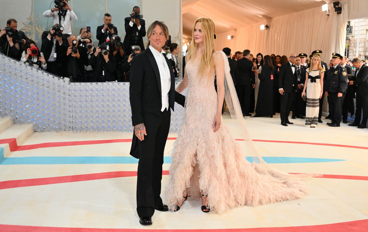 US-Australian actress Nicole Kidman and her husband Australian singer-songwriter Keith Urban arrive for the 2023 Met Gala at the Metropolitan Museum of Art on May 1, 2023, in New York. - The Gala raises money for the Metropolitan Museum of Art's Costume Institute. The Gala's 2023 theme is "Karl Lagerfeld: A Line of Beauty." (Photo by ANGELA WEISS / AFP) (Photo by ANGELA WEISS/AFP via Getty Images)
