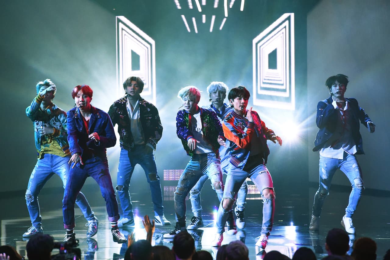 LOS ANGELES, CA - NOVEMBER 19: Music group BTS performs onstage during the 2017 American Music Awards at Microsoft Theater on November 19, 2017 in Los Angeles, California. (Photo by Kevin Winter/Getty Images)