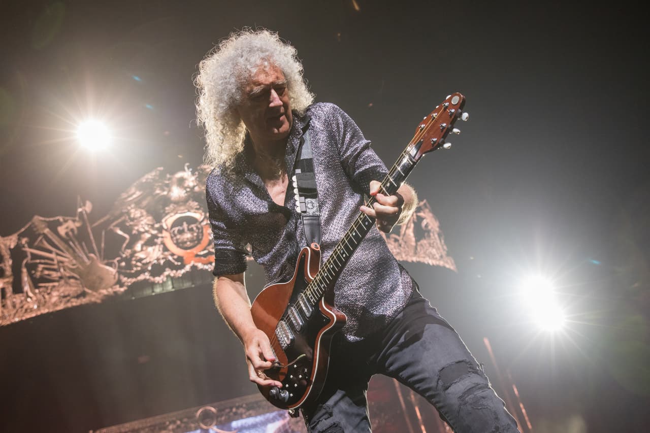 DALLAS, TEXAS - JULY 23: Brian May of Queen + Adam Lambert performs in concert during 'The Rhapsody Tour' at the American Airlines Center on July 23, 2019 in Dallas, Texas. (Photo by Rick Kern/Getty Images)