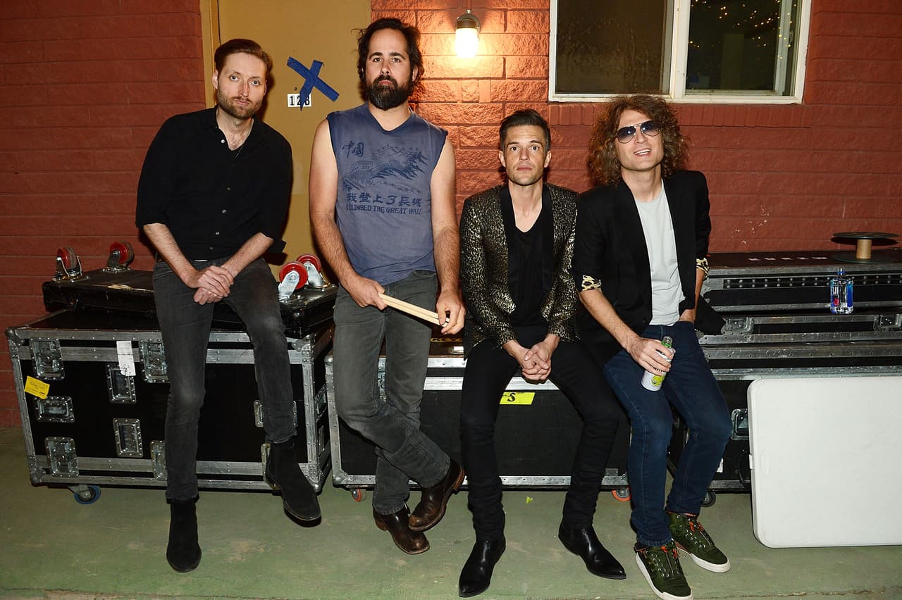 LAS VEGAS, NEVADA - APRIL 07: (EXCLUSIVE COVERAGE) The Killers (L-R) bass guitarist Mark Stoermer, drummer Ronnie Vannucci Jr., singer Brandon Flowers and guitarist Dave Keuning pose at Bunkhouse on April 7, 2016 in Las Vegas, Nevada. (Photo by Denise Truscello/WireImage)