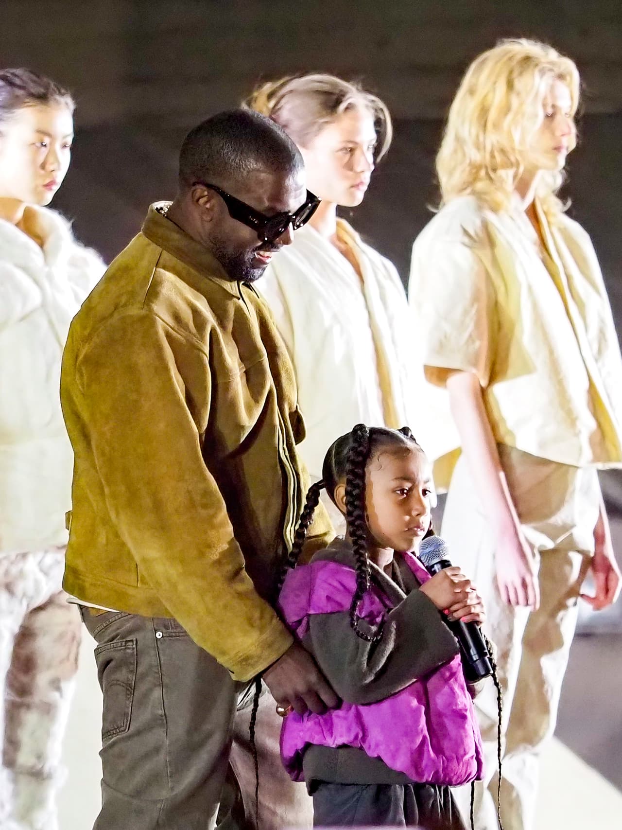 PARIS, FRANCE - MARCH 02: Kanye West and daughter North West attends the "Yeezy Season 8" show as part of the Paris Fashion Week Womenswear Fall/Winter 2020/2021 on March 02, 2020 in Paris, France. (Photo by Arnold Jerocki/GC Images)