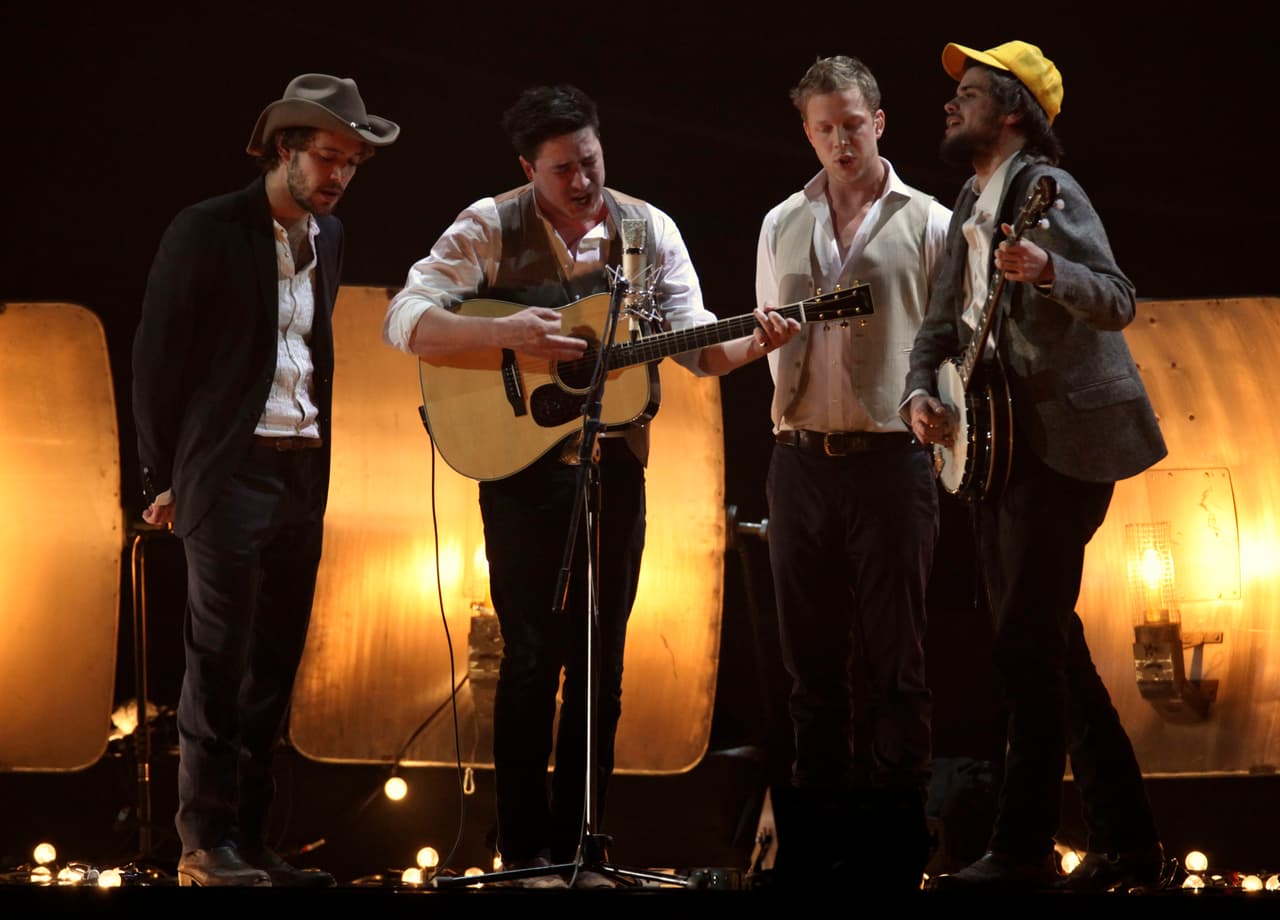 Mumford and Sons perform on stage for the Brit Awards 2011 at The O2 Arena in London, Tuesday, Feb. 15, 2011. (AP Photo/Joel Ryan)