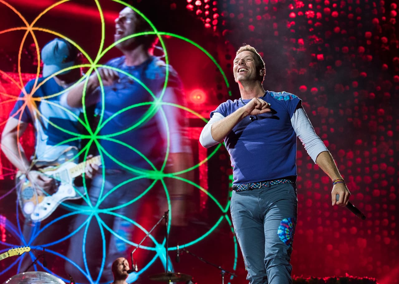 Chris Martin of Coldplay performs onstage at the Rogers Centre on Monday, August 21, 2017 in Toronto, Canada. (Photo by Arthur Mola/Invision/AP)