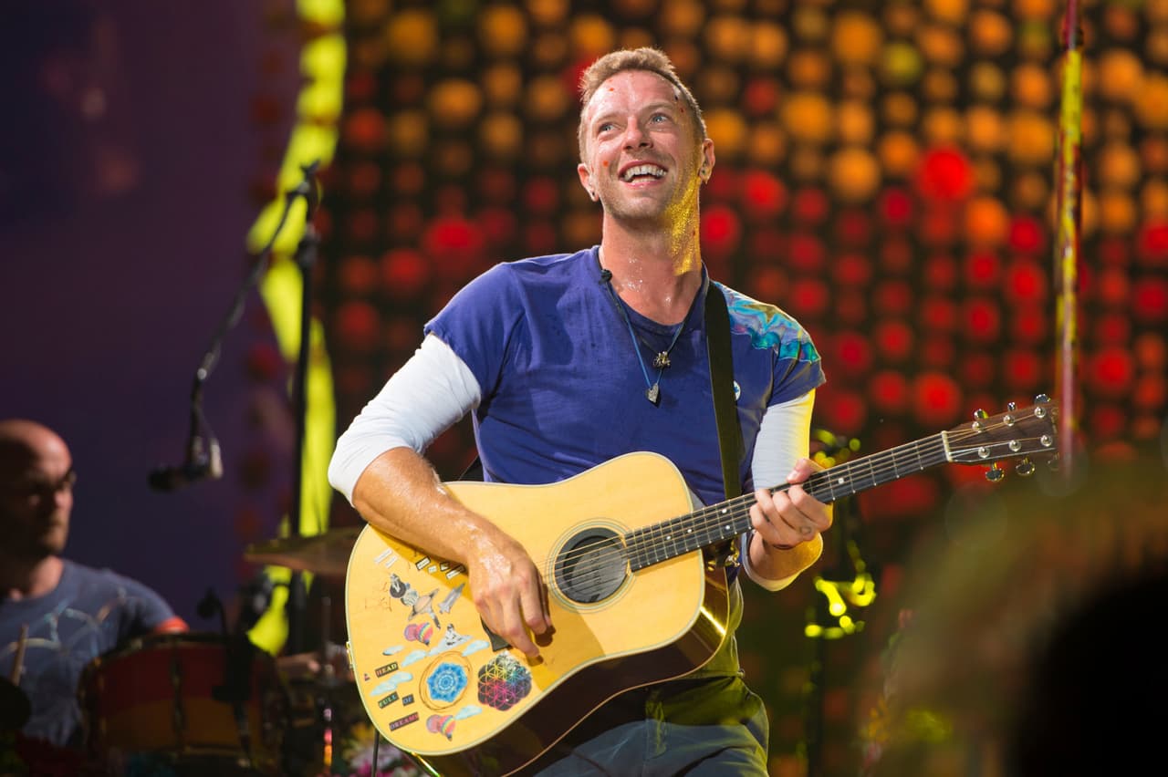 Chris Martin of Coldplay performs at Metlife Stadium on Tuesday, August 1, 2017, in East Rutherford, N.J. (Photo by Scott Roth/Invision/AP)