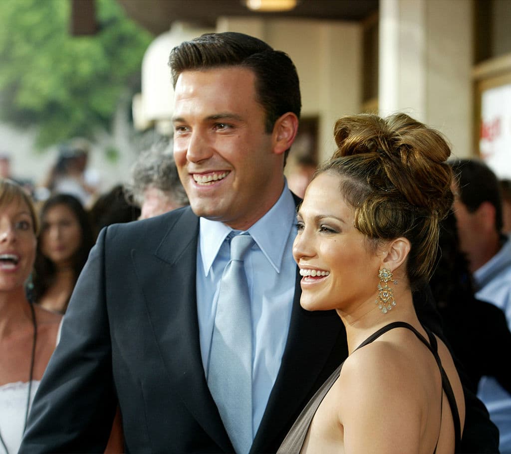 WESTWOOD, CA - JULY 27: Actress Jennifer Lopez and actor Ben Affleck attend the premiere of Revolution Studios' and Columbia Pictures' film "Gigli" at the Mann National Theatre July 27, 2003 in Westwood, California. "Gigli" opens nationwide on August 1, 2003. (Photo by Kevin Winter/Getty Images)