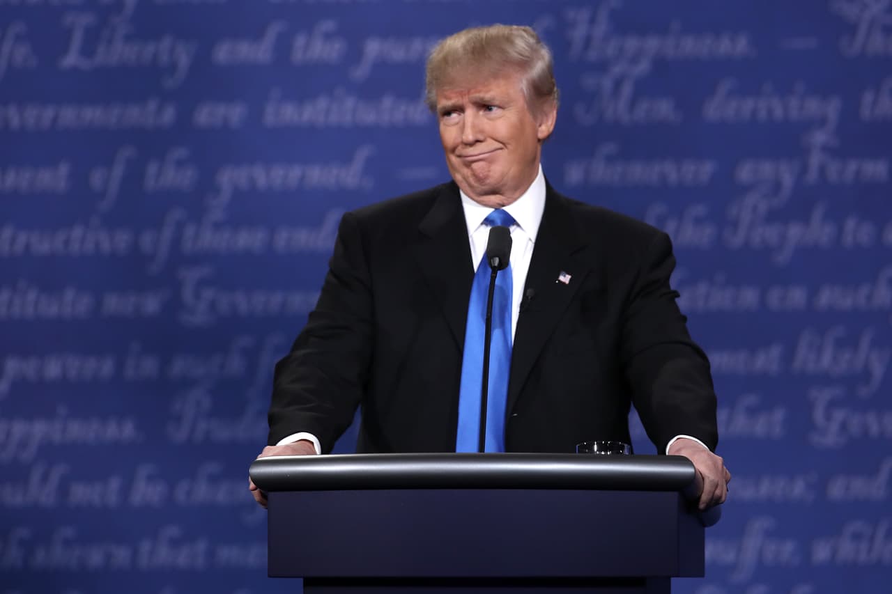 HEMPSTEAD, NY - SEPTEMBER 26: Republican presidential nominee Donald Trump makes a face during the Presidential Debate at Hofstra University on September 26, 2016 in Hempstead, New York. The first of four debates for the 2016 Election, three Presidential and one Vice Presidential, is moderated by NBC's Lester Holt. (Photo by Win McNamee/Getty Images)